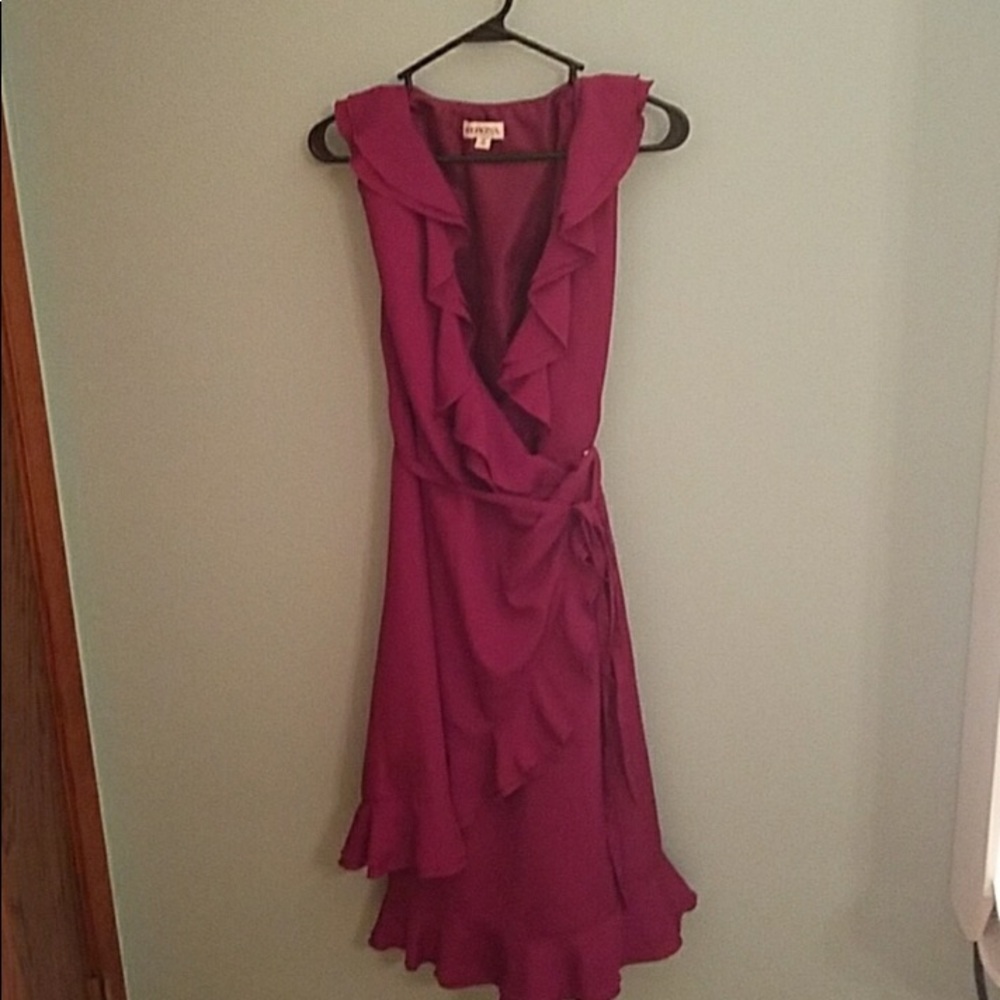 Beautiful ruffle wrap dress. Pinkish purple.